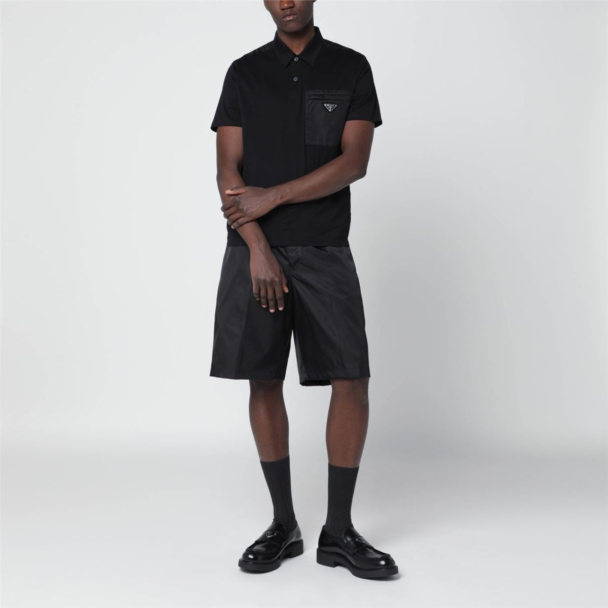 Black cotton stretch and re-nylon polo shirt-PRADA-Verso