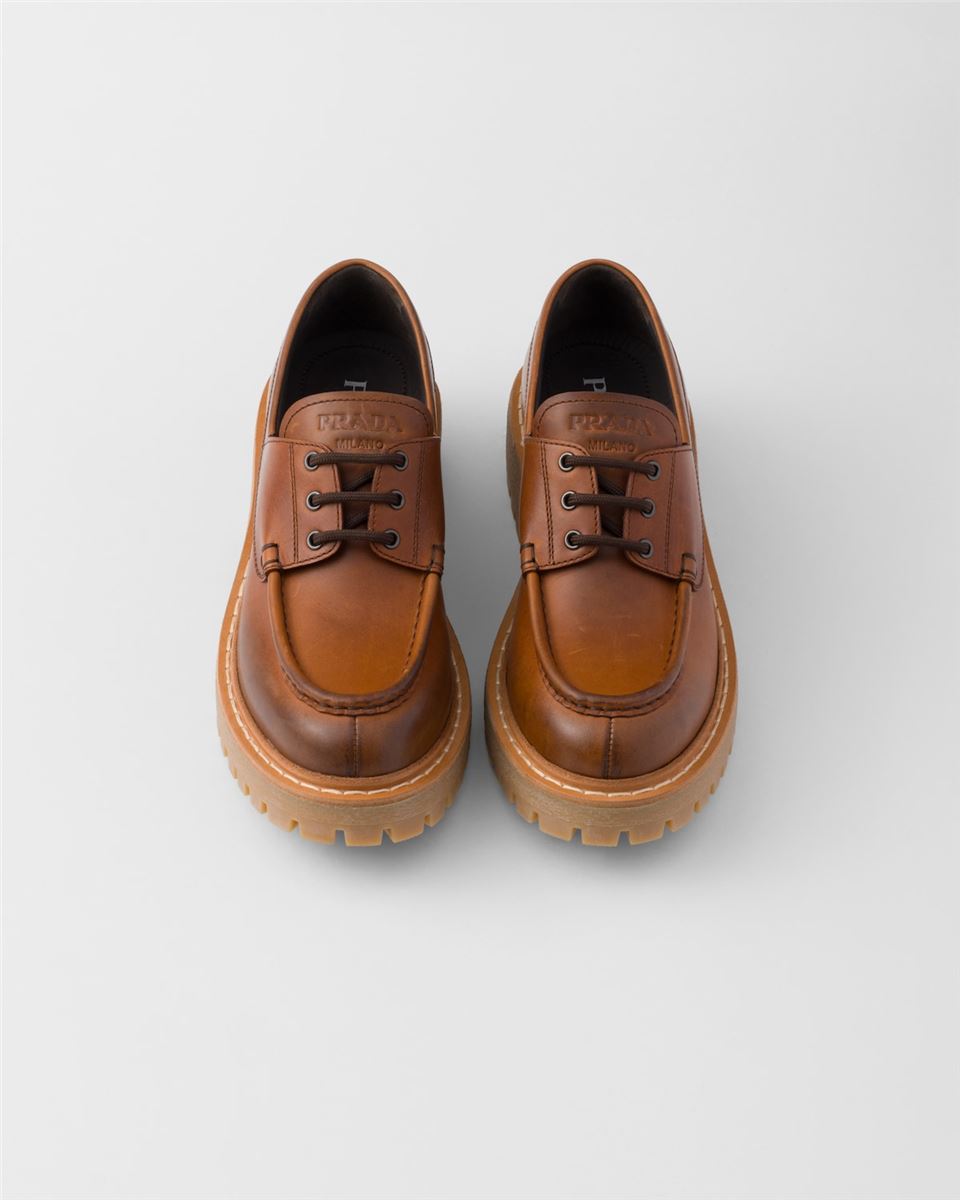 LACED LEATHER LOAFERS - PRADA - Verso
