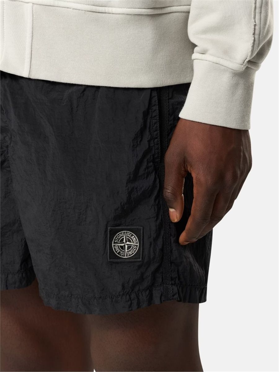 Slim-fit swim shorts with pockets