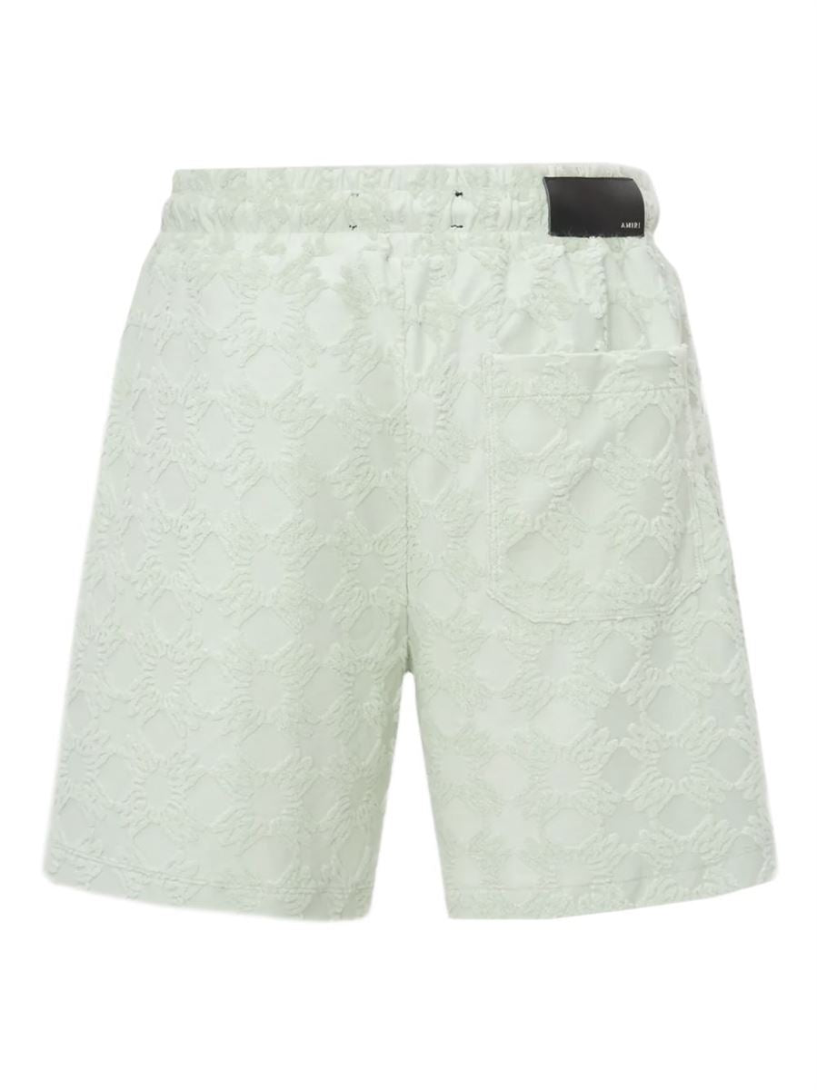 SHORTS WITH EMBOSSED PATTERN - AMIRI - Verso
