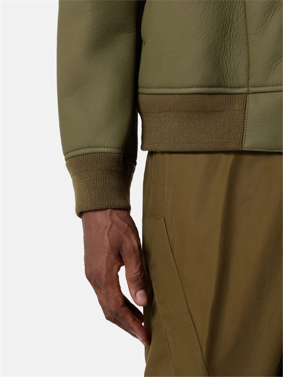Coach jacket with sprayed rubberised finish