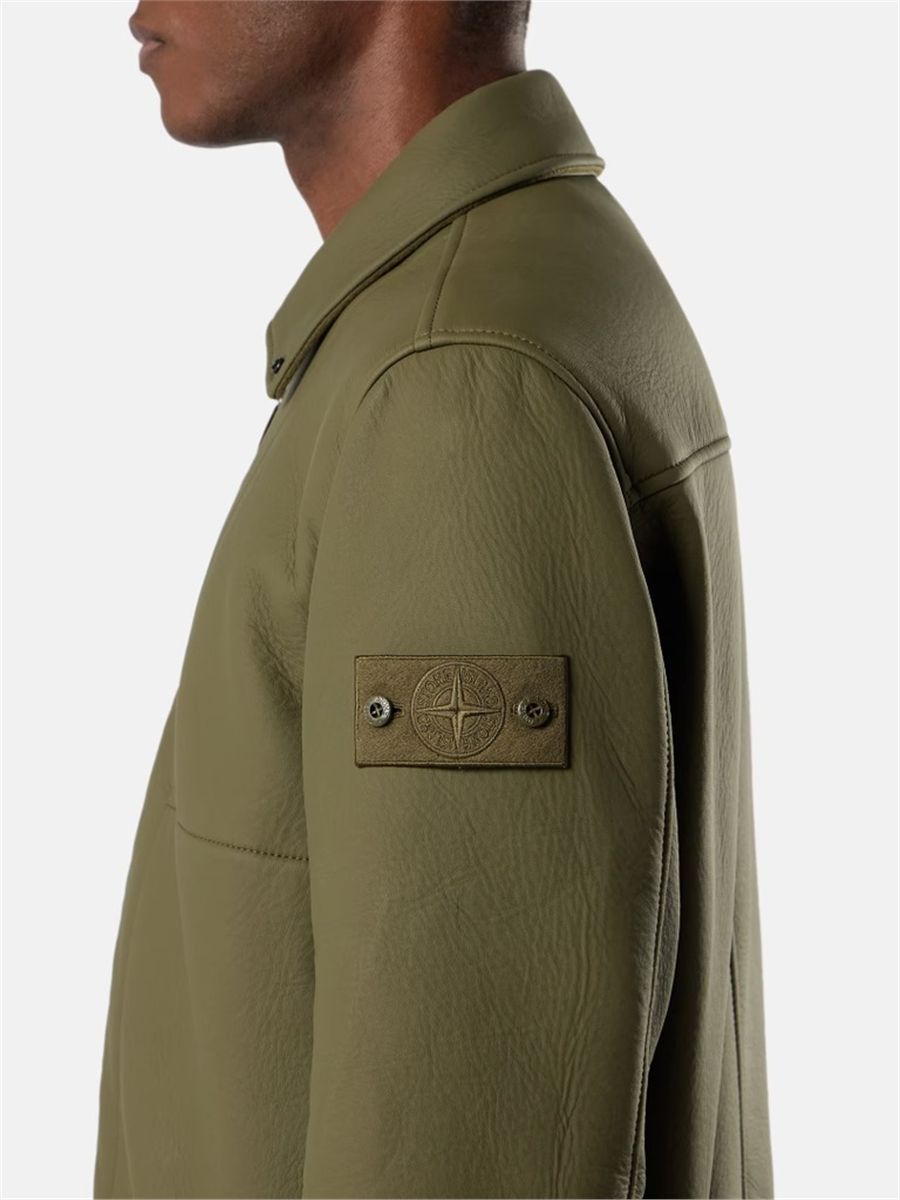 Coach jacket with sprayed rubberised finish