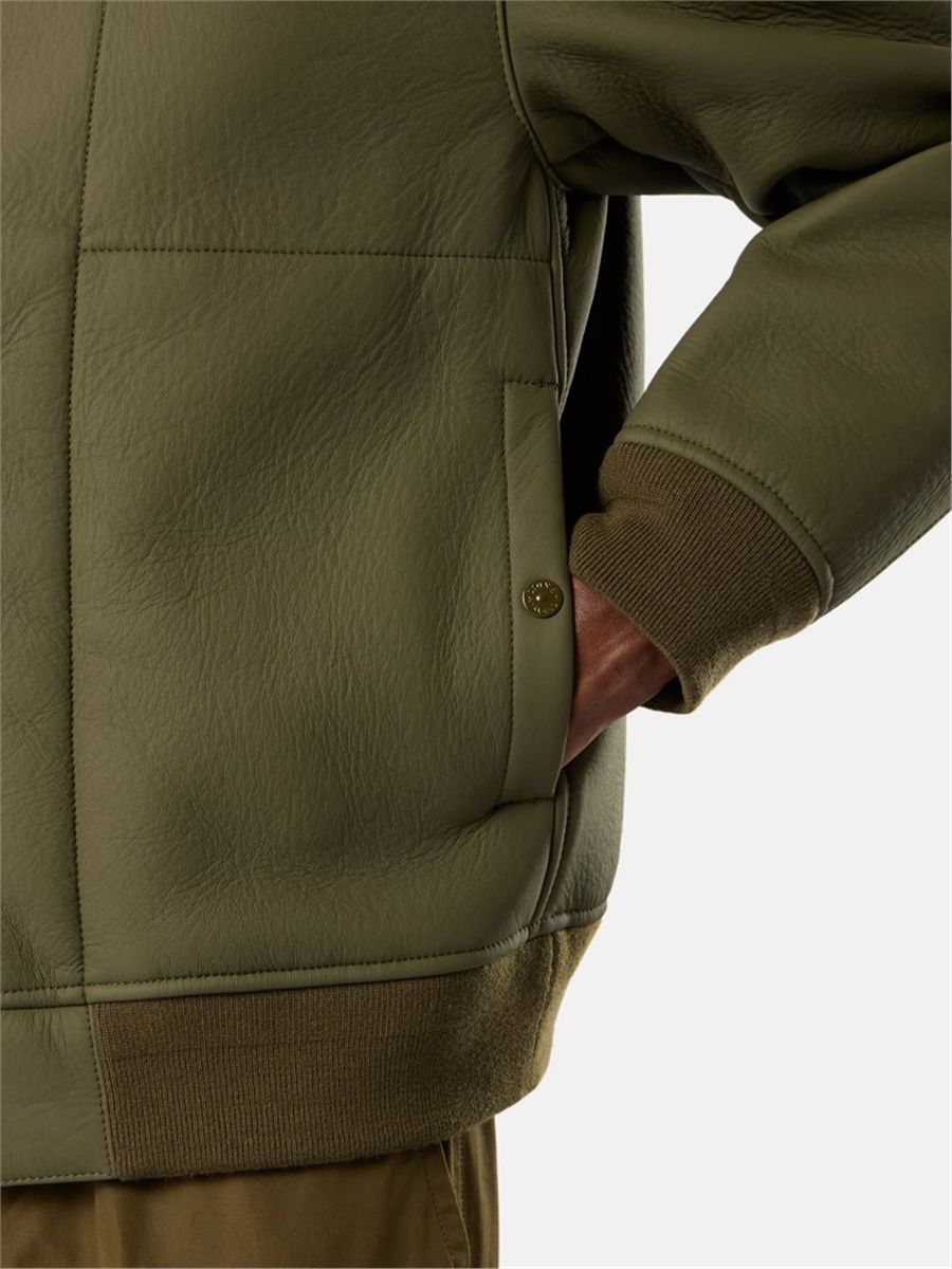 Coach jacket with sprayed rubberised finish