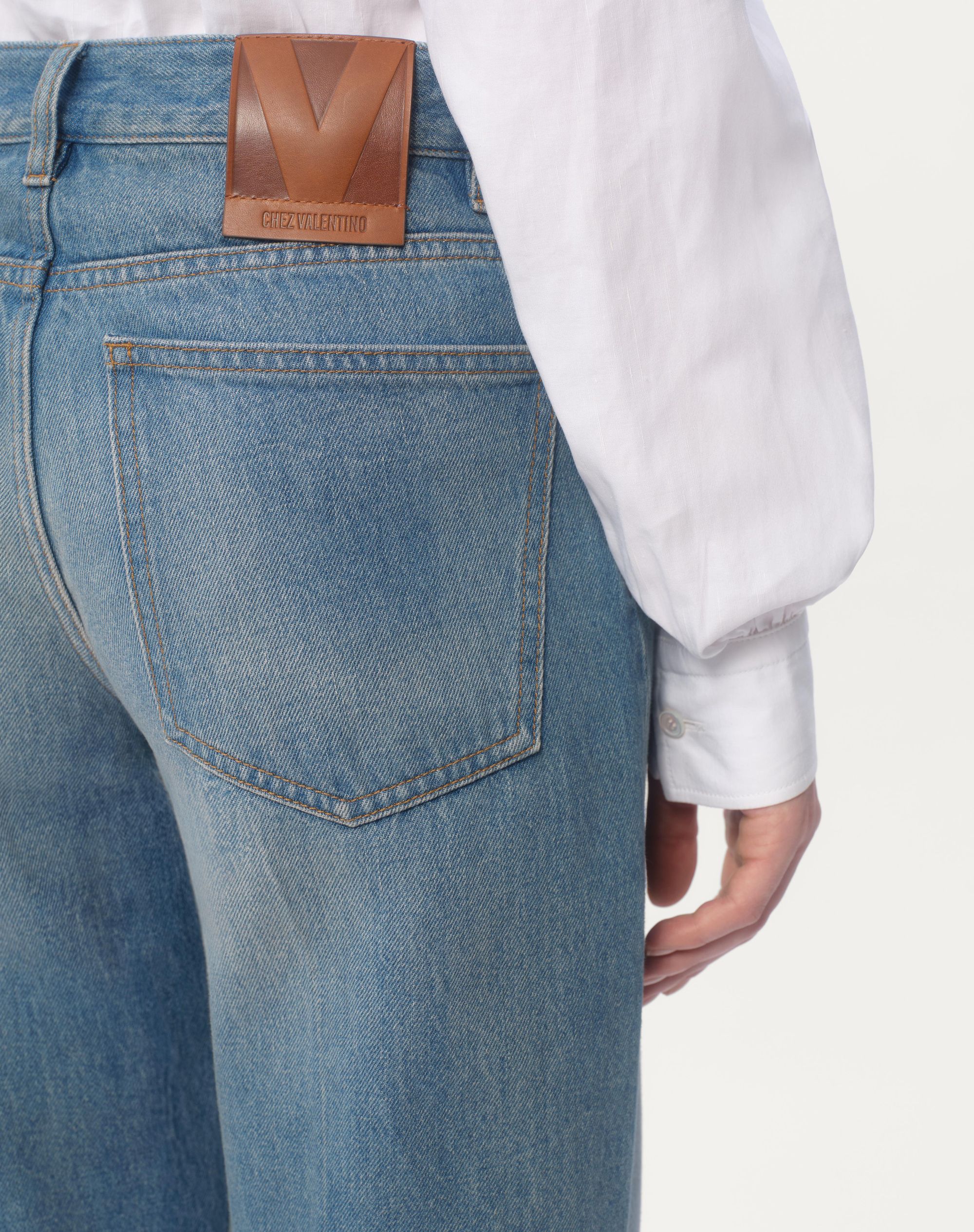 DENIM TROUSERS WITH JACQUARD TRIMS -  VALENTINO -  Verso