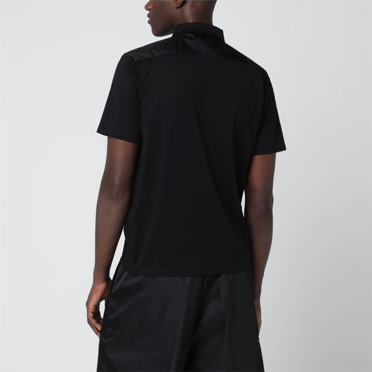 Black cotton stretch and re-nylon polo shirt-PRADA-Verso