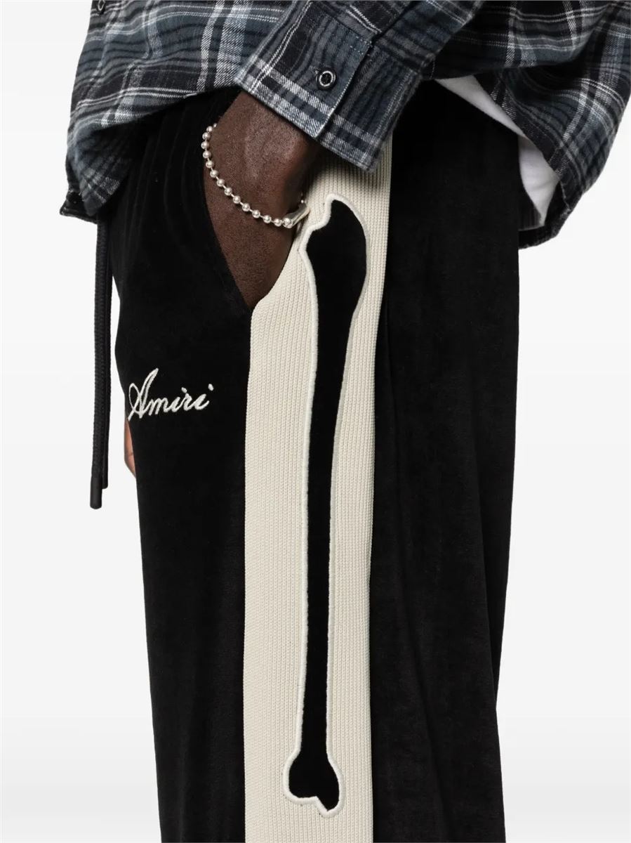 Bones velvet-effect track pants-AMIRI-Verso