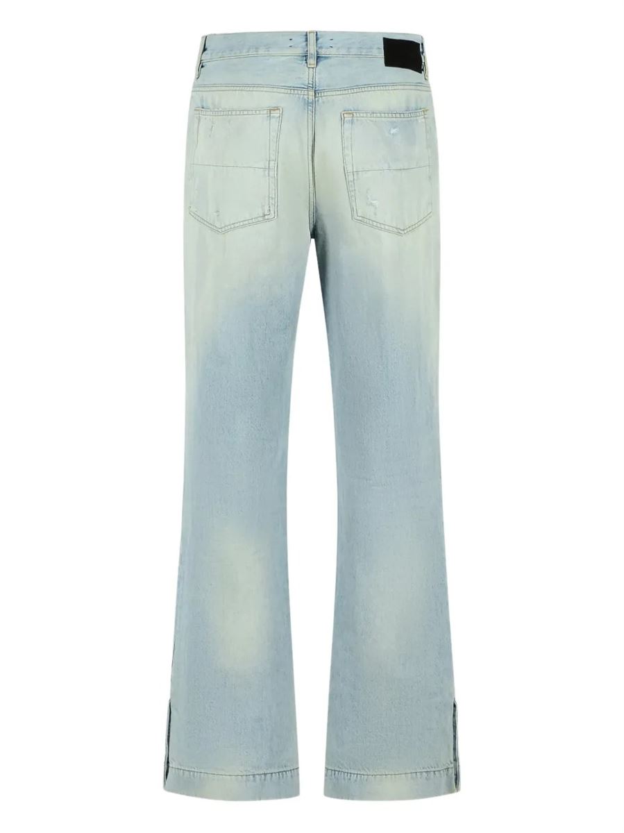 Distressed-effect flared jeans-AMIRI-Verso