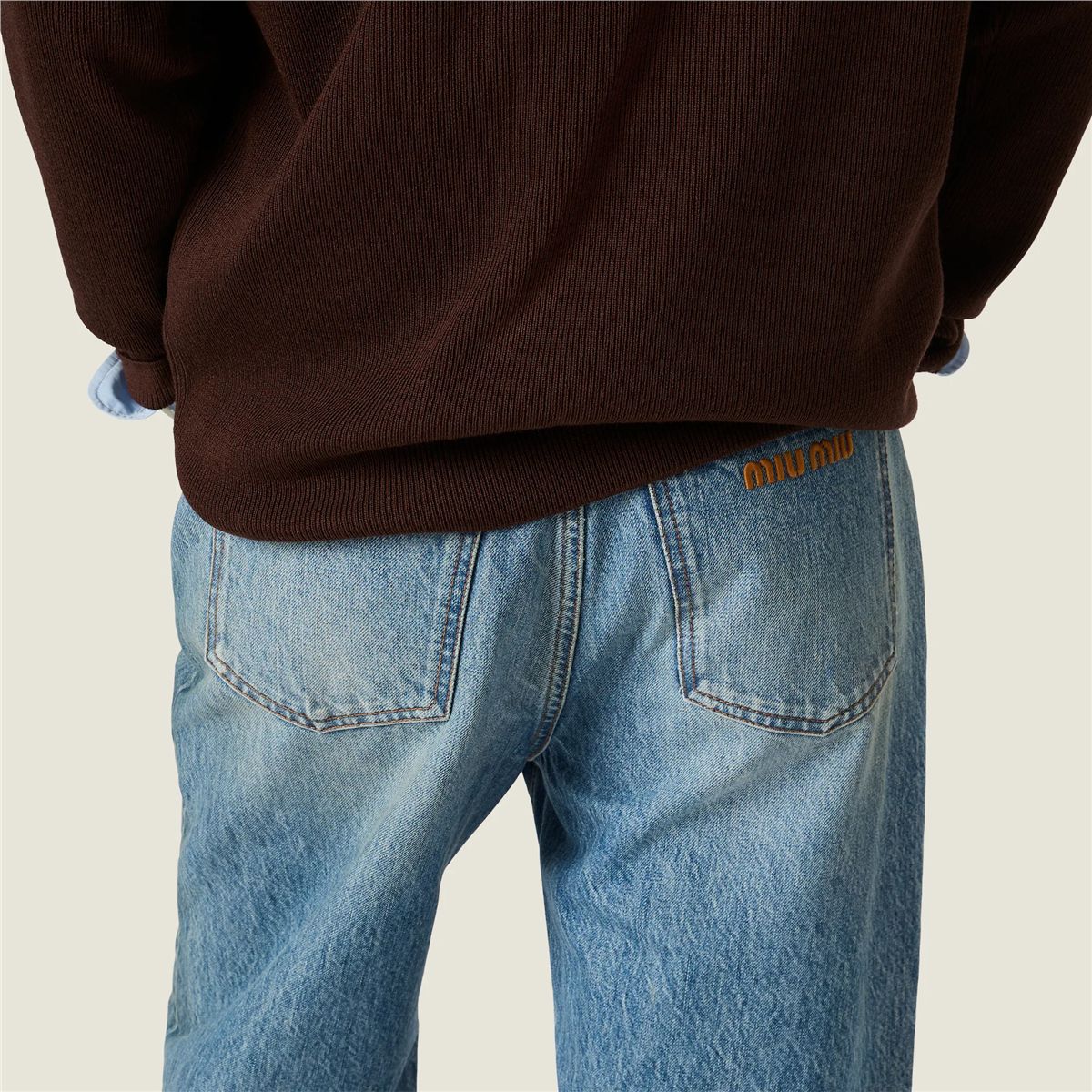 Five-pocket washed denim jeans-MIU MIU-Verso