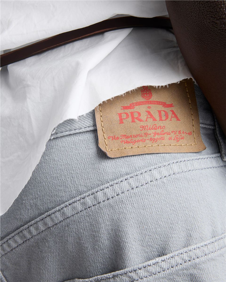 Five-pocket washed denim jeans-PRADA-Verso
