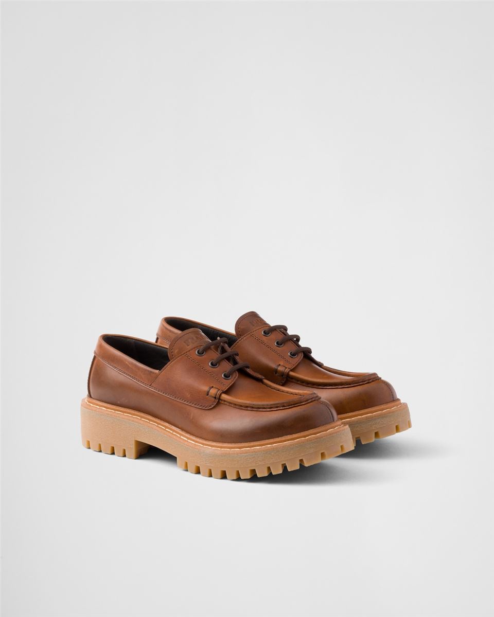 LACED LEATHER LOAFERS -  PRADA -  Verso