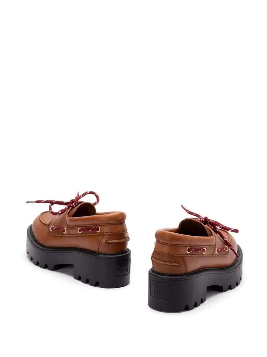 LEATHER LOAFERS MIU MIU