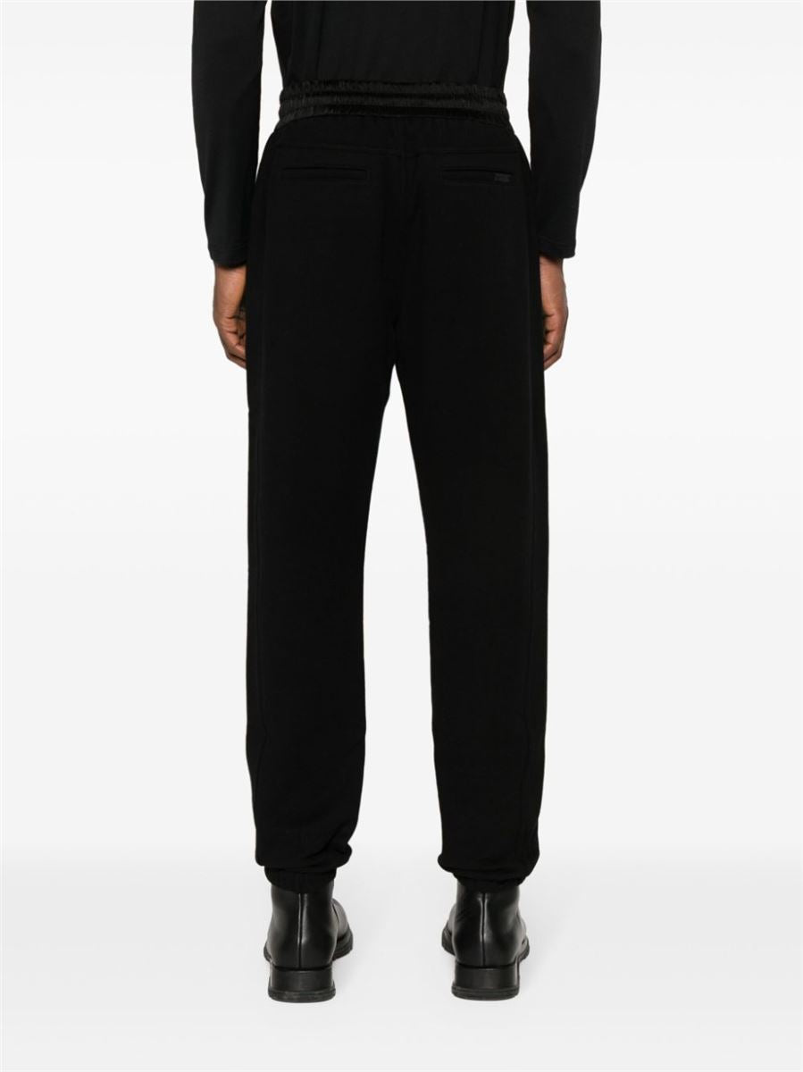 LOGO-EMBROIDERED TRACK PANTS -  SAINT LAURENT -  Verso