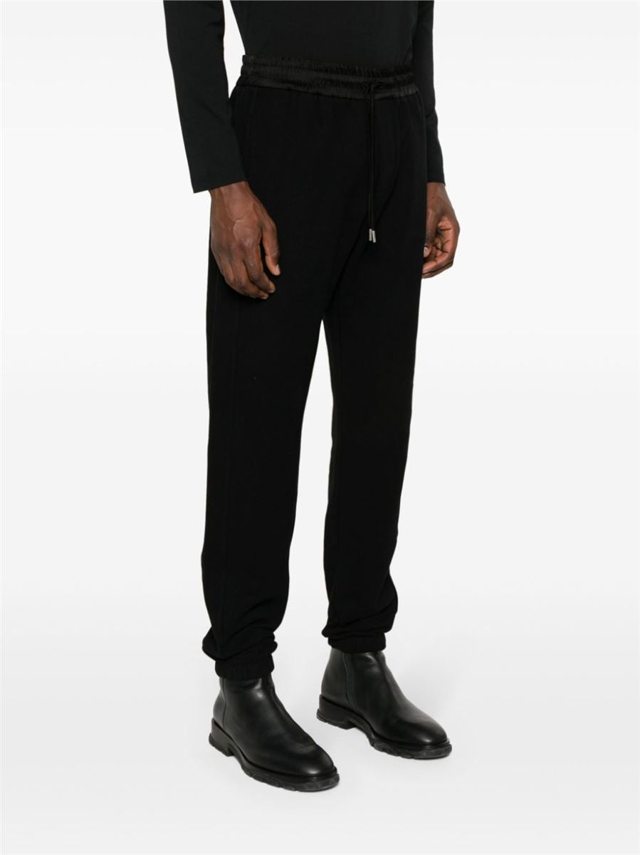 LOGO-EMBROIDERED TRACK PANTS -  SAINT LAURENT -  Verso