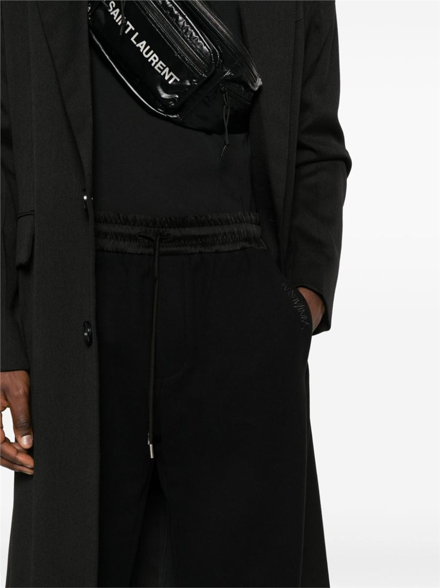 LOGO-EMBROIDERED TRACK PANTS -  SAINT LAURENT -  Verso