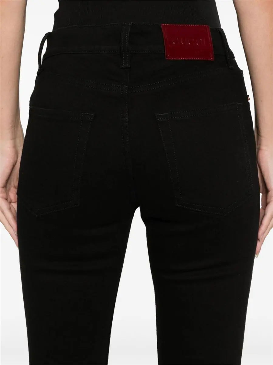 LOGO-PATCH JEANS GUCCI