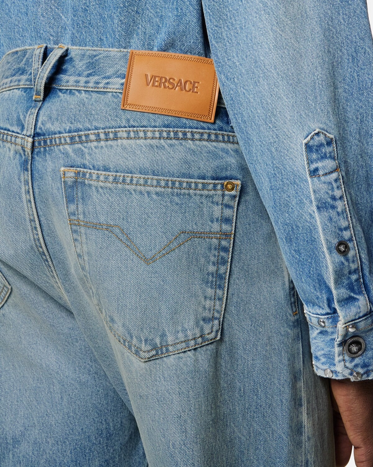 Medusa Buckle Cotton Wide-leg Jeans-VERSACE-Verso