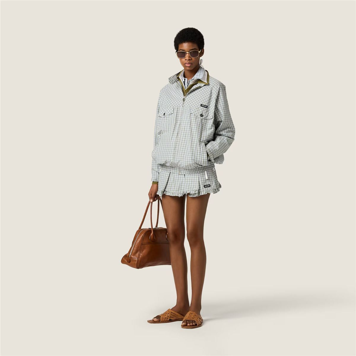Pleated check miniskirt