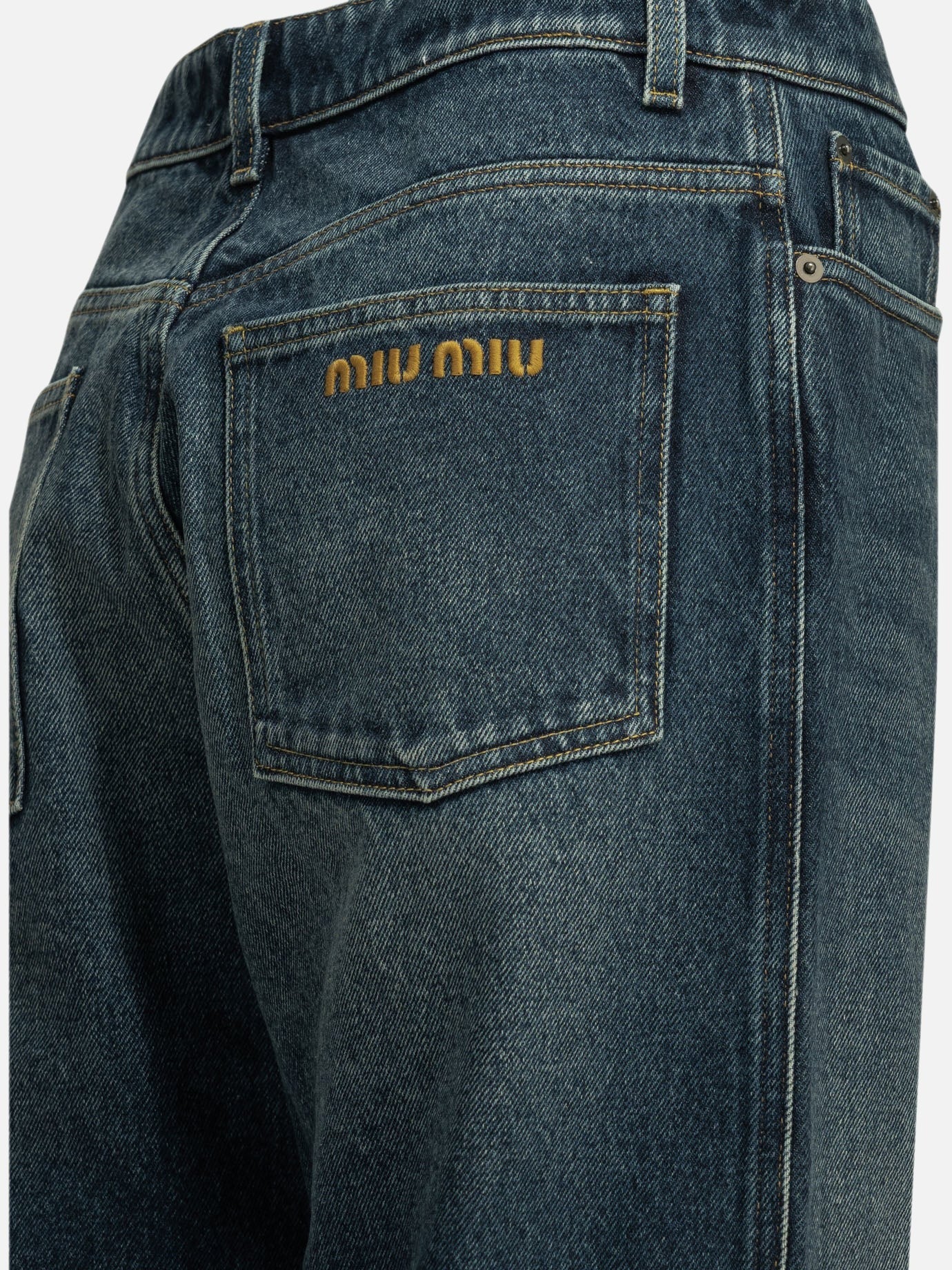 Straight-leg jeans with reverse logo-MIU MIU-Verso