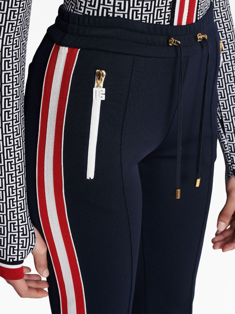 STRIPE-DETAIL FLARED TROUSERS