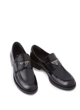 TRIANGLE-LOGO LEATHER LOAFERS
