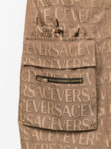 ALLOVER LOGO-PRINT CARGO TROUSERS