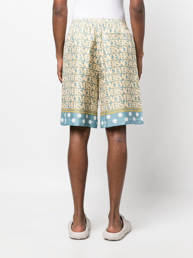 VERSACE ALLOVER-PRINT SILK SHORTS