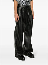 FAUX-LEATHER FLARED TROUSERS