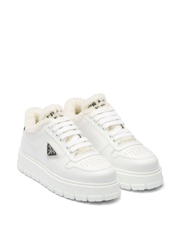 TRIANGLE-PLAQUE LOW-TOP SNEAKERS