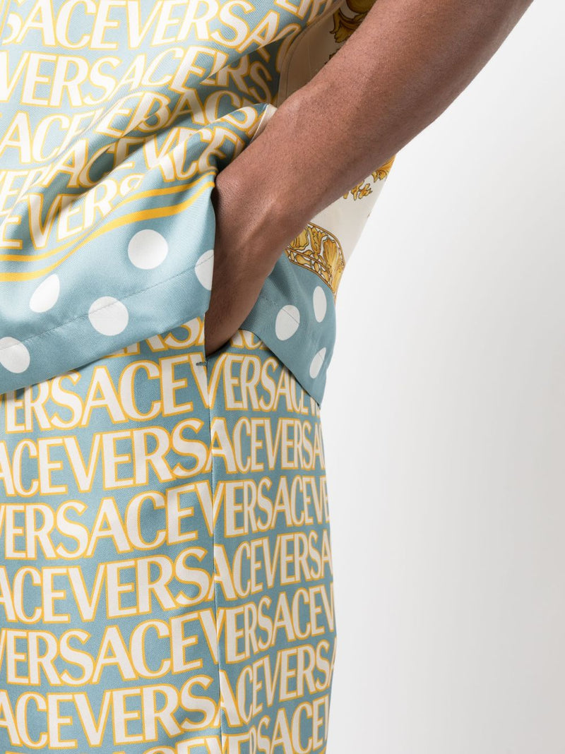 VERSACE ALLOVER-PRINT SILK SHORTS